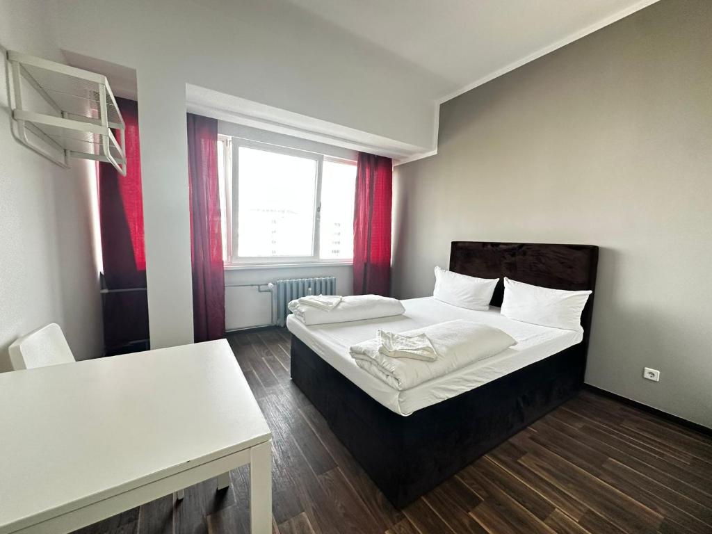 Postel nebo postele na pokoji v ubytování Ootel.com
