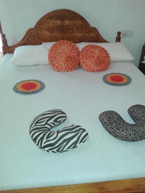 Postel nebo postele na pokoji v ubytování Lak Nilla Guest House