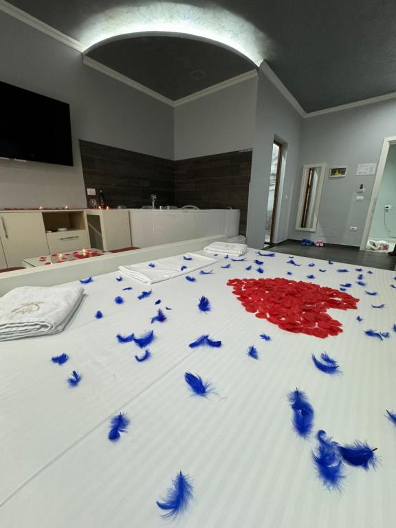 Postel nebo postele na pokoji v ubytování Imperium Hotel