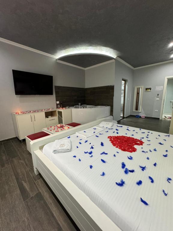 Postel nebo postele na pokoji v ubytování Imperium Hotel