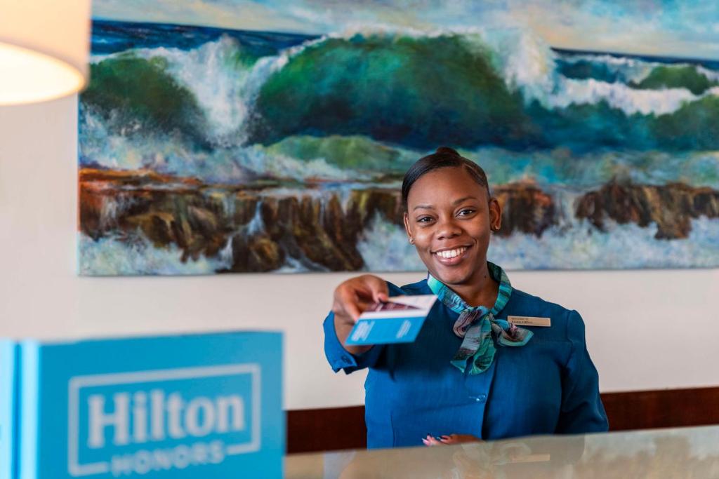 Členové personálu v ubytování Hilton Barbados Resort