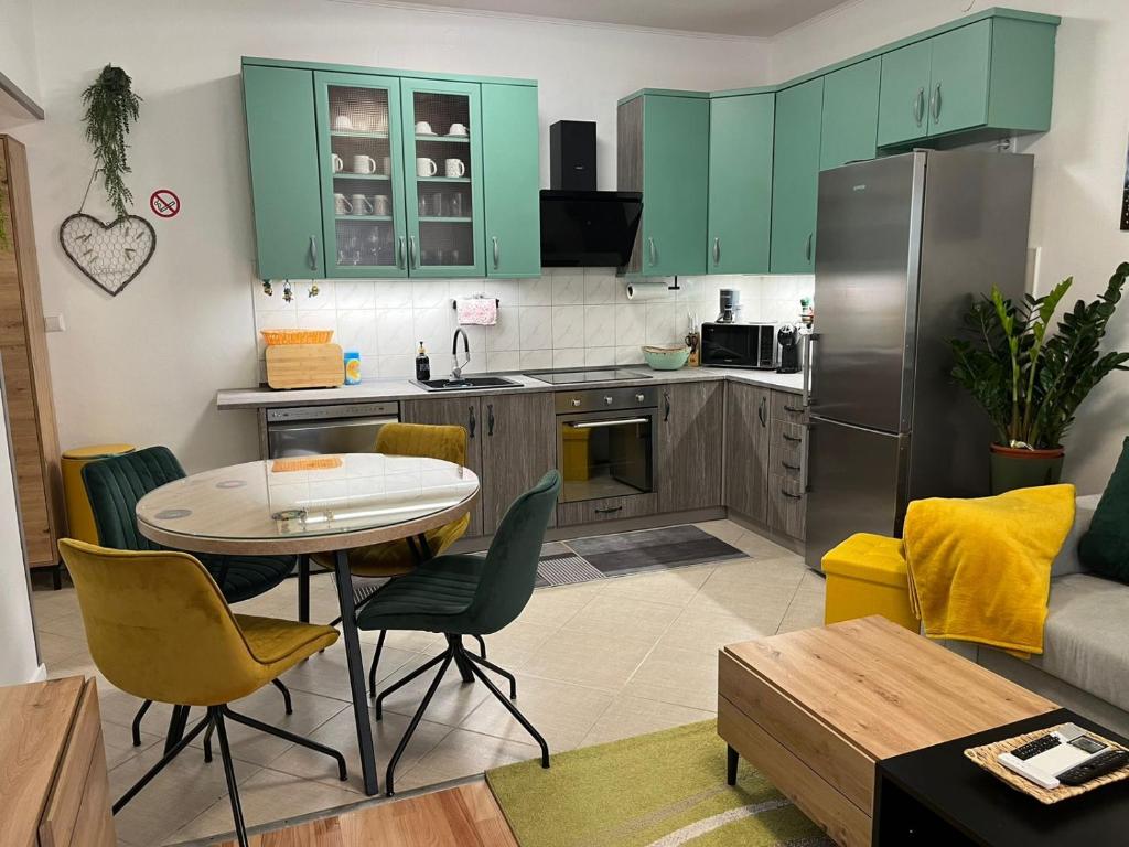 Kuchyňa alebo kuchynka v ubytovaní Dioklecian Dream Apartment