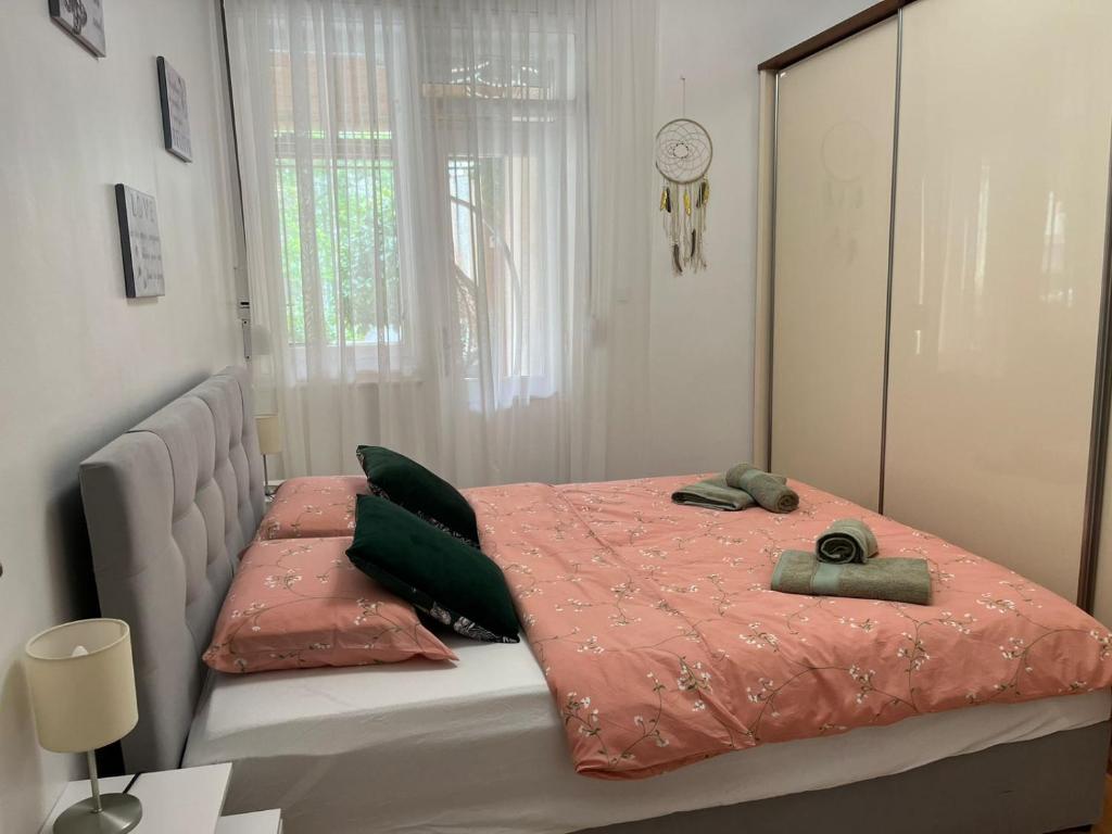 Posteľ alebo postele v izbe v ubytovaní Dioklecian Dream Apartment