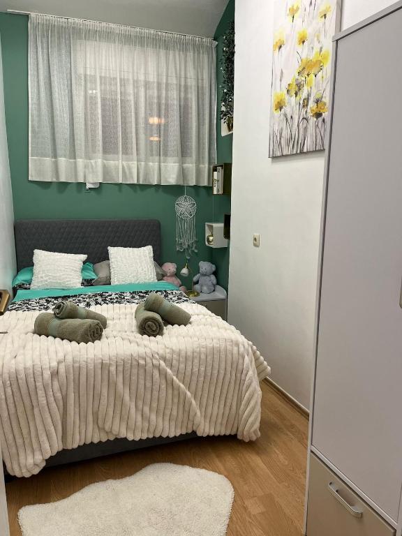 Posteľ alebo postele v izbe v ubytovaní Dioklecian Dream Apartment