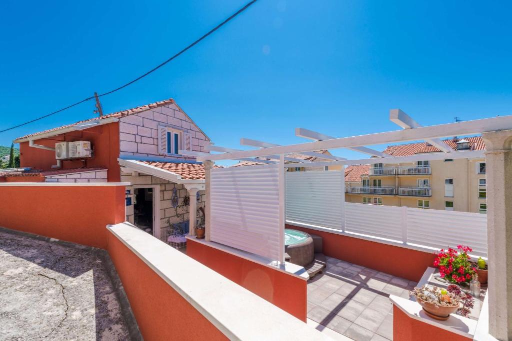 a view from the balcony of a house at Seaside house for families with children Cavtat, Dubrovnik - 22828 in Cavtat