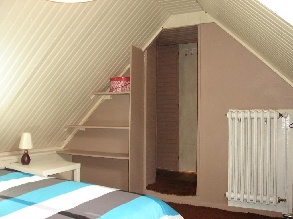 Postel nebo postele na pokoji v ubytování Gîte de la Chapelle