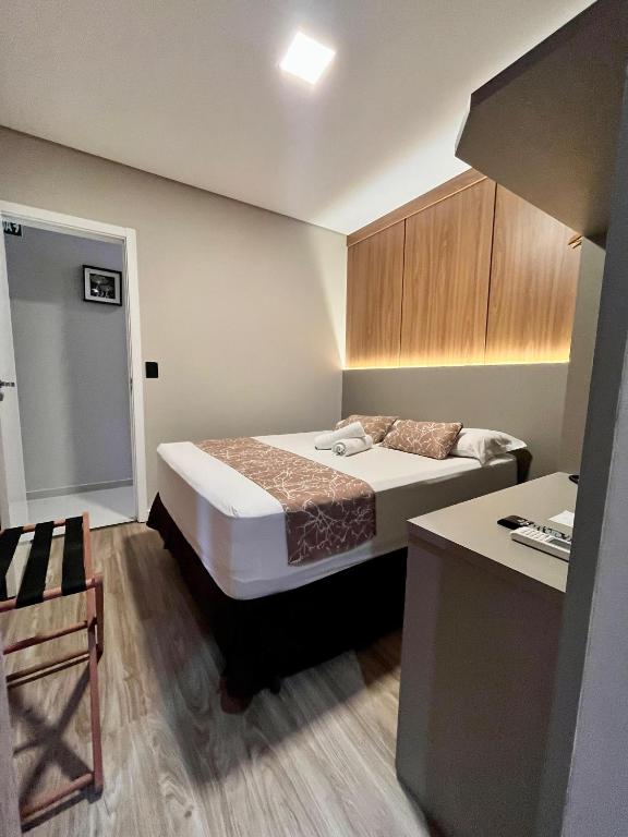 Postel nebo postele na pokoji v ubytování Hotel Lorimar