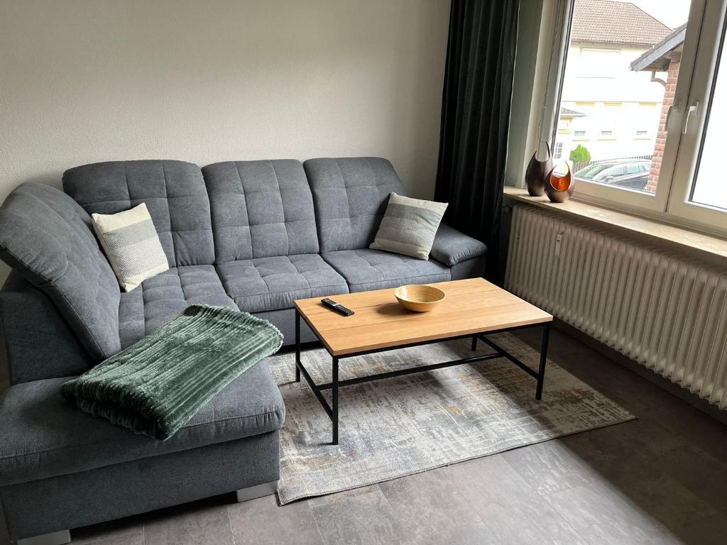 a living room with a couch and a coffee table at International 7 in Bad Harzburg