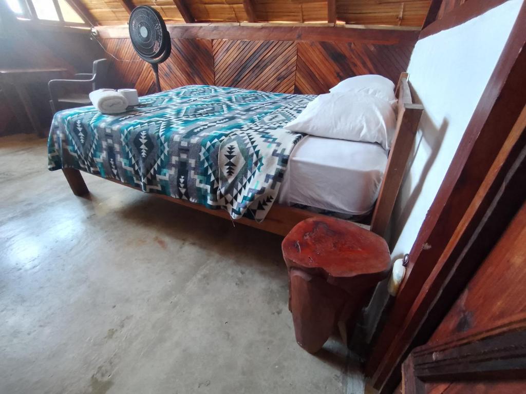Postel nebo postele na pokoji v ubytování Hotel Palma Coco