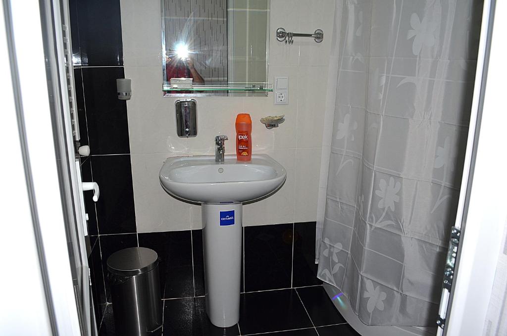 Koupelna v ubytování Hotel Okriba