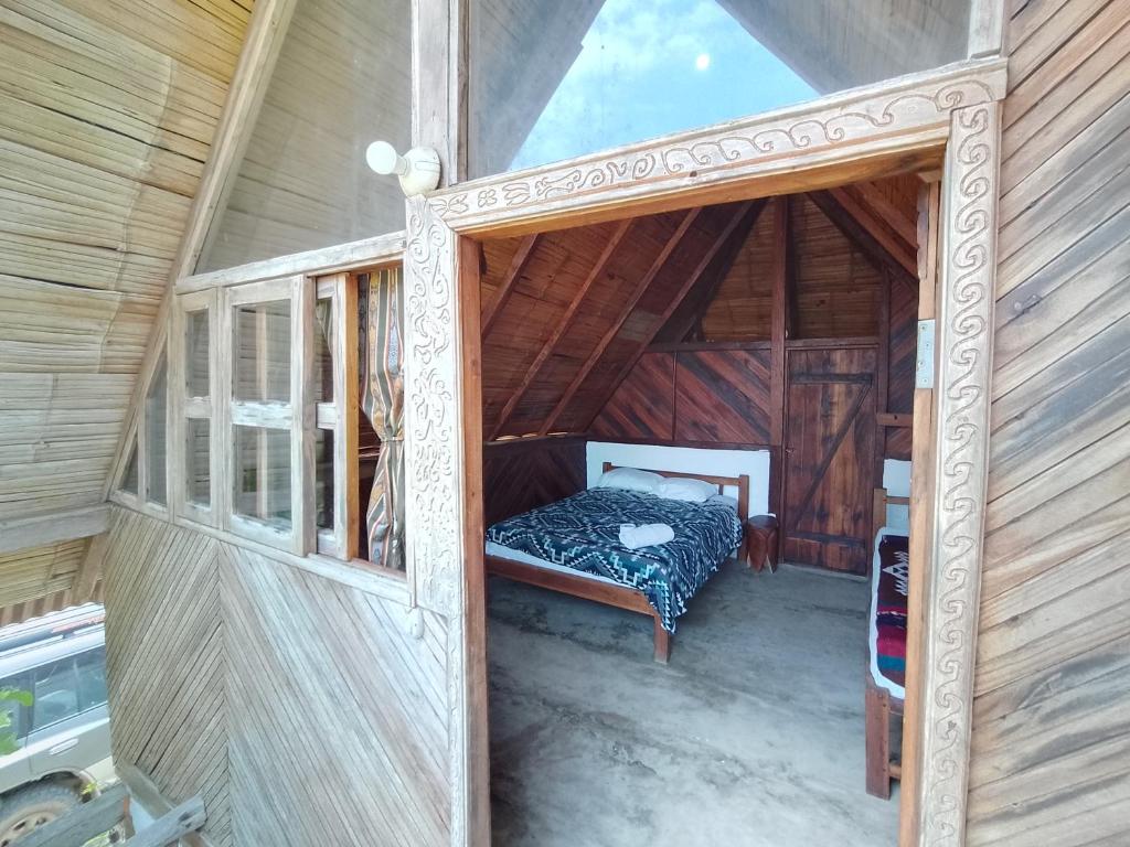 Postel nebo postele na pokoji v ubytování Hotel Palma Coco