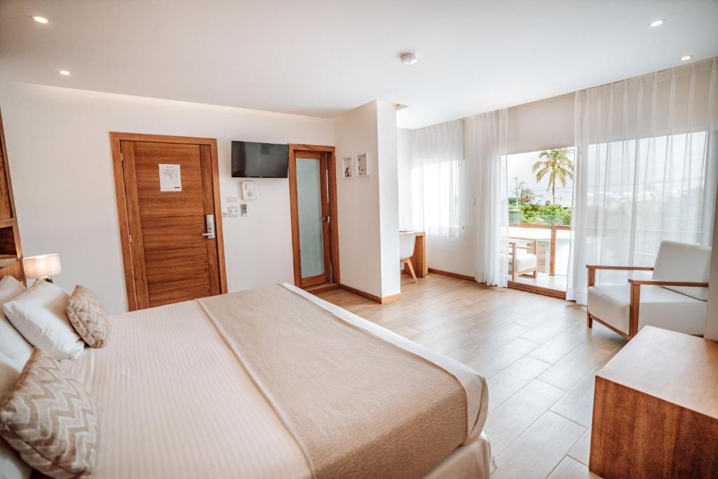 Postel nebo postele na pokoji v ubytování Hotel Acacia