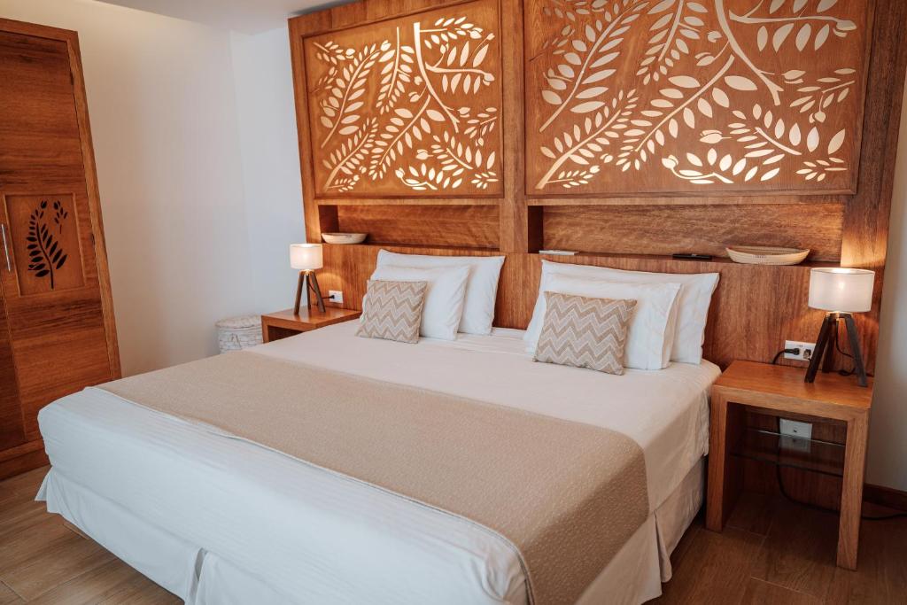 Postel nebo postele na pokoji v ubytování Hotel Acacia
