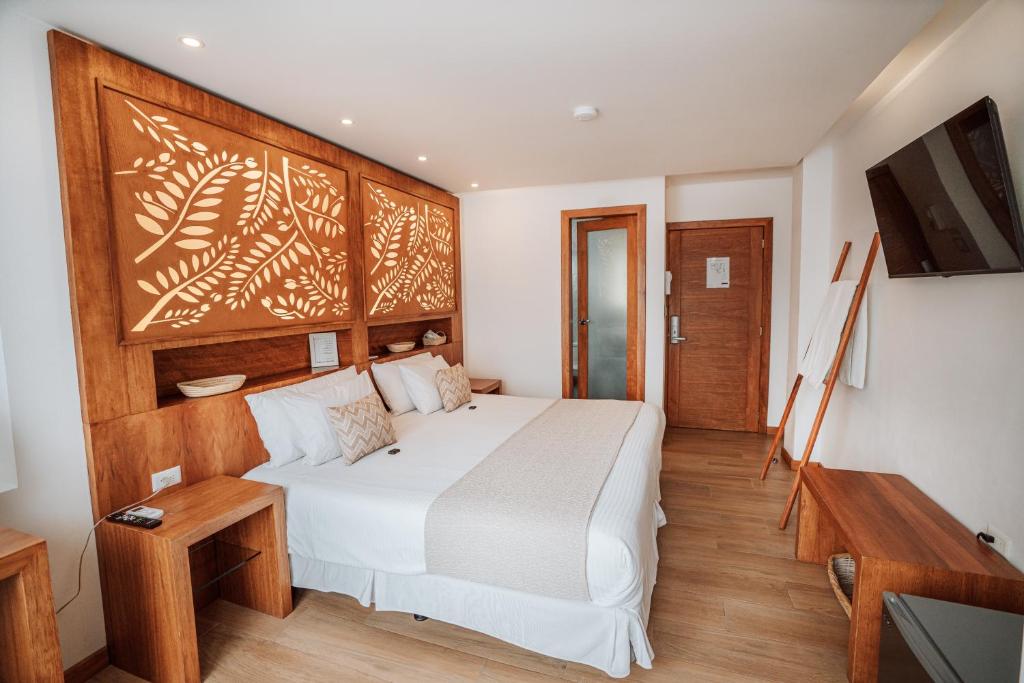 Postel nebo postele na pokoji v ubytování Hotel Acacia