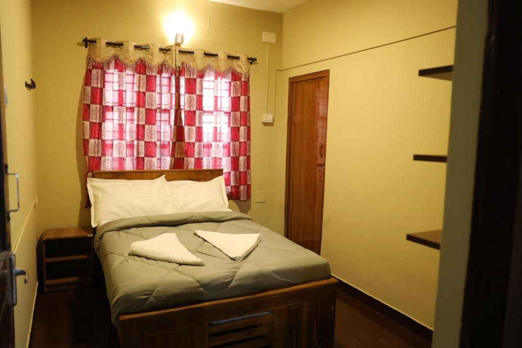 Postel nebo postele na pokoji v ubytování LA SIESTA