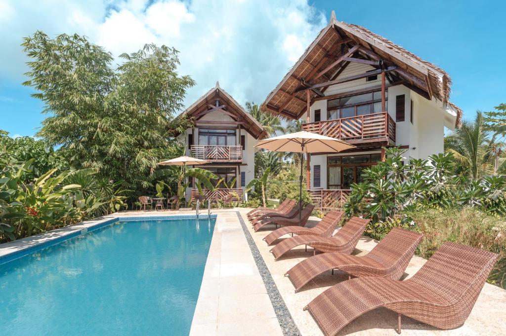 Bazén v ubytování Bulan Villas Siargao nebo v jeho okolí