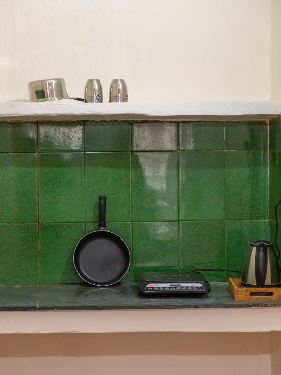 Kuchyň nebo kuchyňský kout v ubytování Mohija Homestay