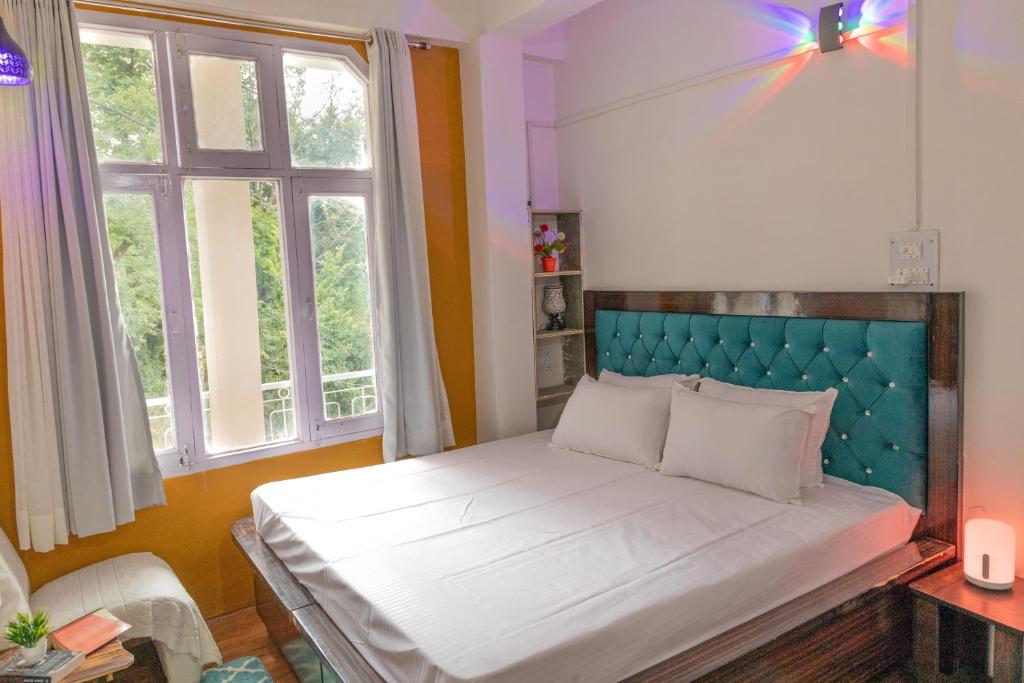 Postel nebo postele na pokoji v ubytování Mohija Homestay