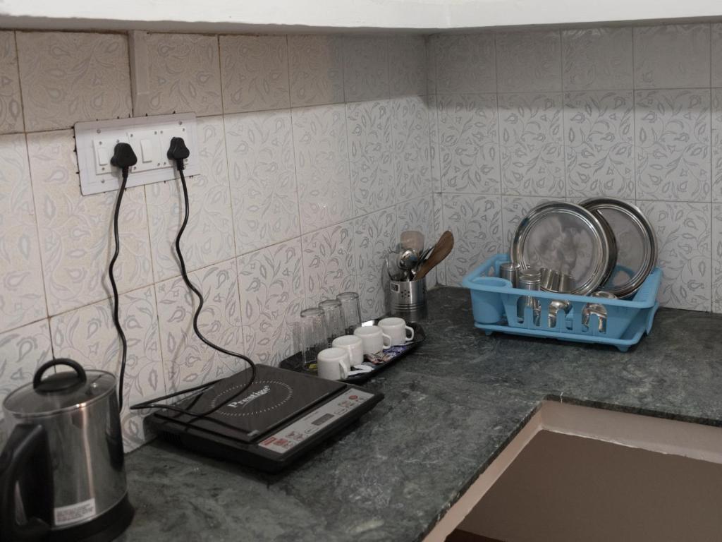 Kuchyň nebo kuchyňský kout v ubytování Mohija Homestay