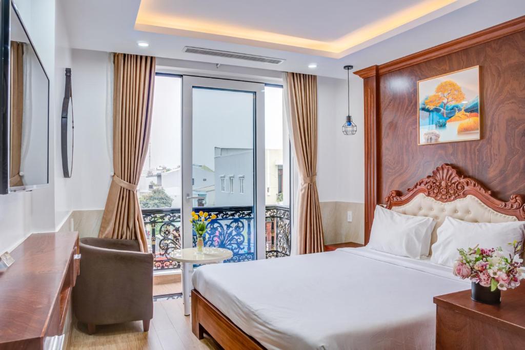 Postel nebo postele na pokoji v ubytování Phan Van 2 hotel