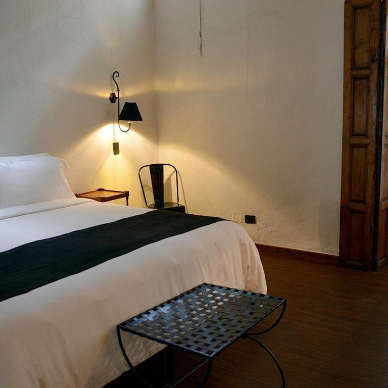Postel nebo postele na pokoji v ubytování Casa de Los Olivos