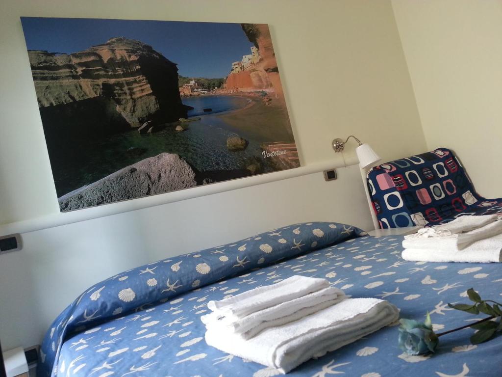 Postel nebo postele na pokoji v ubytování Hotel Tirreno Formia