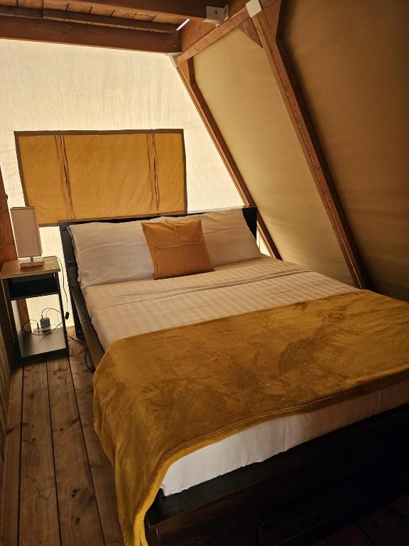Postel nebo postele na pokoji v ubytování Aquamare Beach Camp Resort