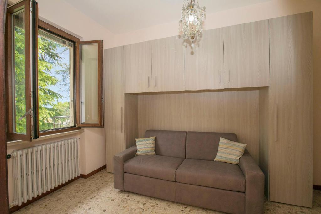 Część wypoczynkowa w obiekcie Villa Alberti Appartamento Emma - Happy Rentals