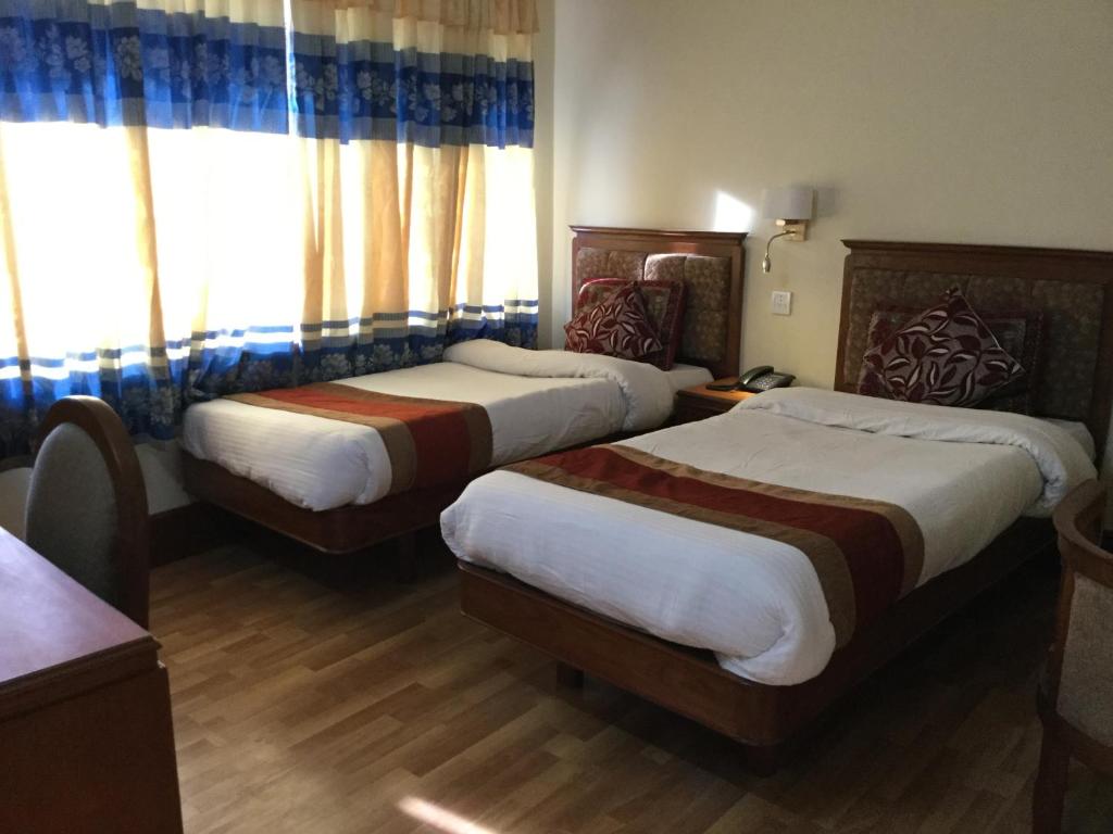Postel nebo postele na pokoji v ubytování Trekkers Home