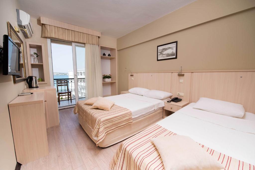 Tempat tidur dalam kamar di İleri Hotel & Apartments