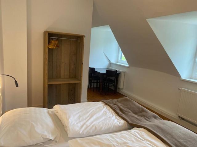 Postel nebo postele na pokoji v ubytování Die Strumpffabrik - Guesthouse