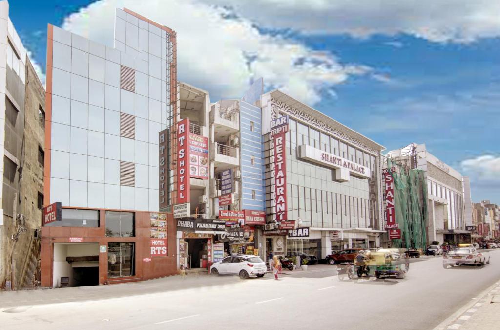 a rendering of a city street with cars and buildings at RTS Hotel Delhi Airport in New Delhi