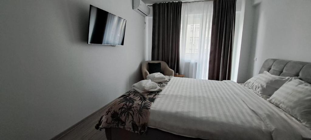 Кровать или кровати в номере Relax Home Apartment Q