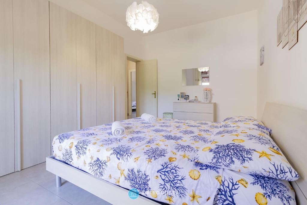 Ένα ή περισσότερα κρεβάτια σε δωμάτιο στο Iris Flat - San Foca