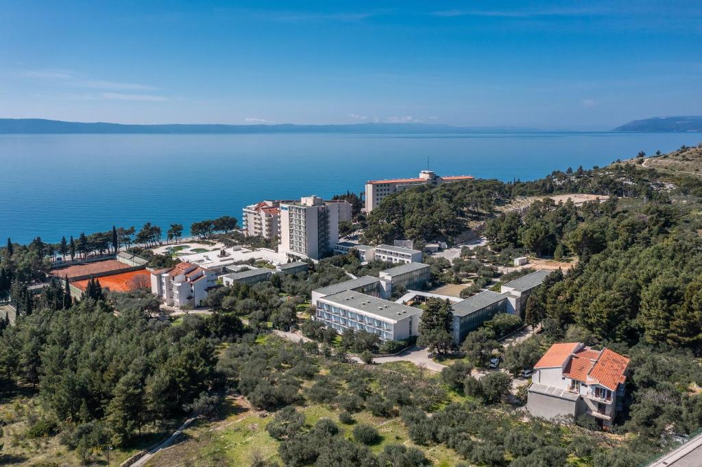 an aerial view of a city and a body of water at Rooms Olive and Sea in Tučepi
