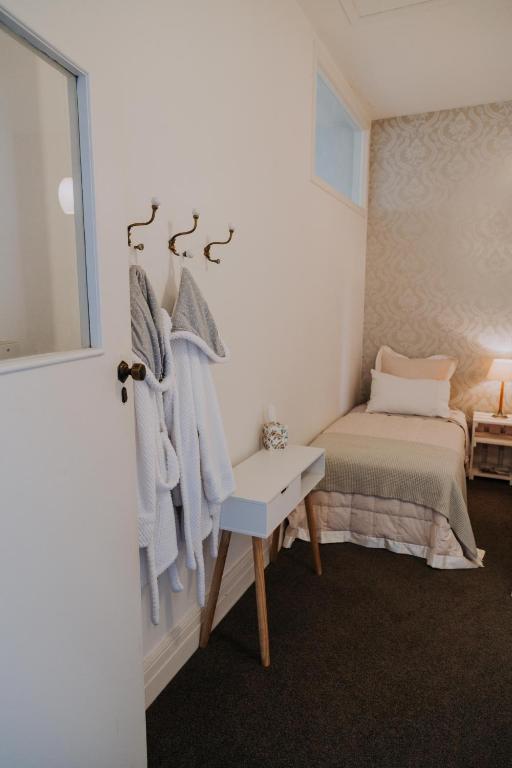 Postel nebo postele na pokoji v ubytování Postmasters Apartment Motueka