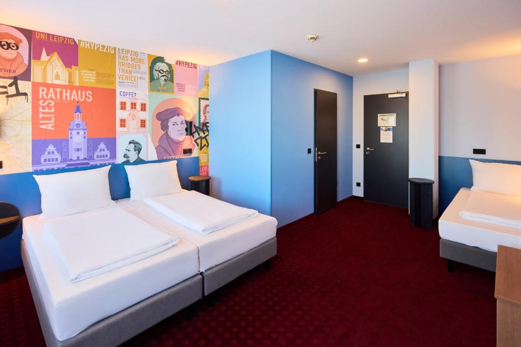 Postel nebo postele na pokoji v ubytování McDreams Hotel Leipzig