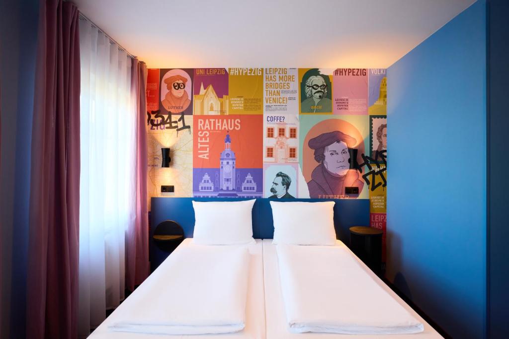 Postel nebo postele na pokoji v ubytování McDreams Hotel Leipzig