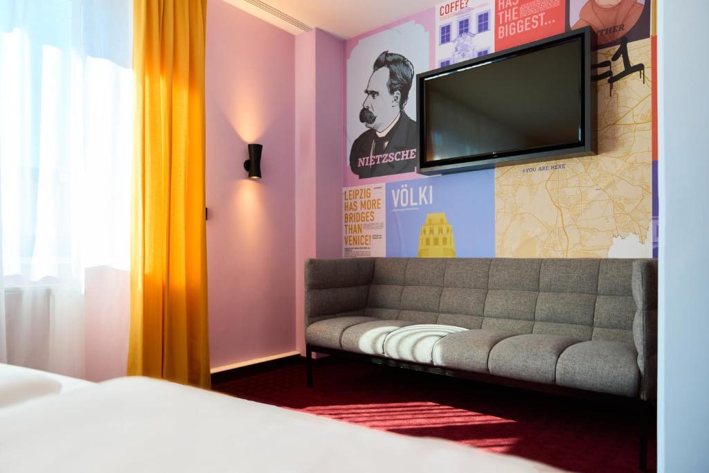 Postel nebo postele na pokoji v ubytování McDreams Hotel Leipzig