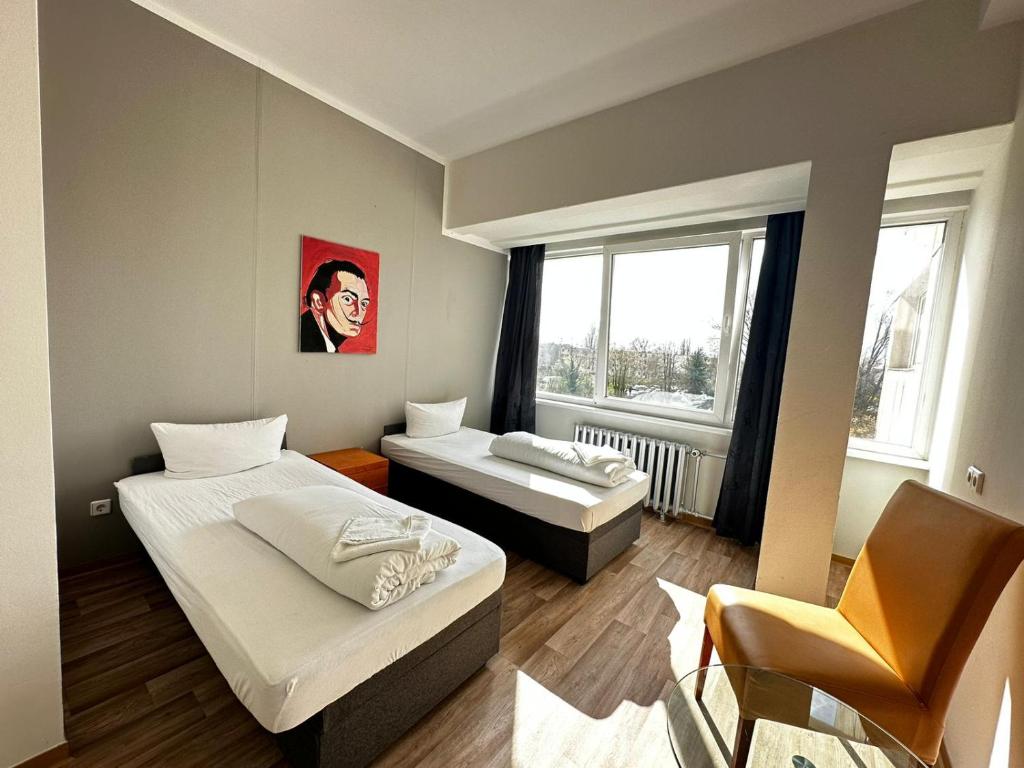 Postel nebo postele na pokoji v ubytování Ootel.com