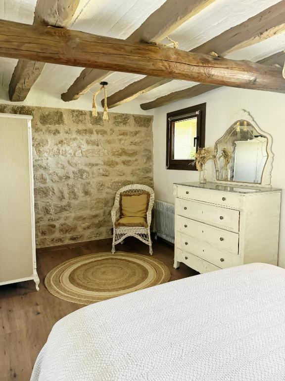 Postel nebo postele na pokoji v ubytování Masia Aubareda