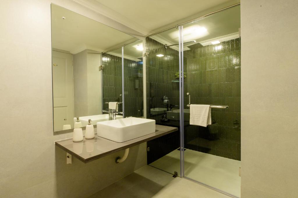 Ванная комната в Aguada Anchorage - The Villa Resort, Candolim
