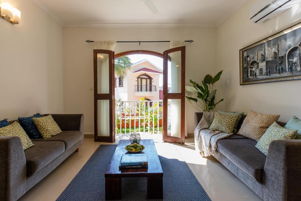 Гостиная зона в Aguada Anchorage - The Villa Resort, Candolim