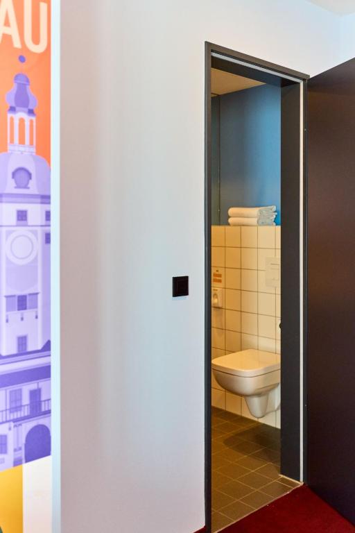Koupelna v ubytování McDreams Hotel Leipzig