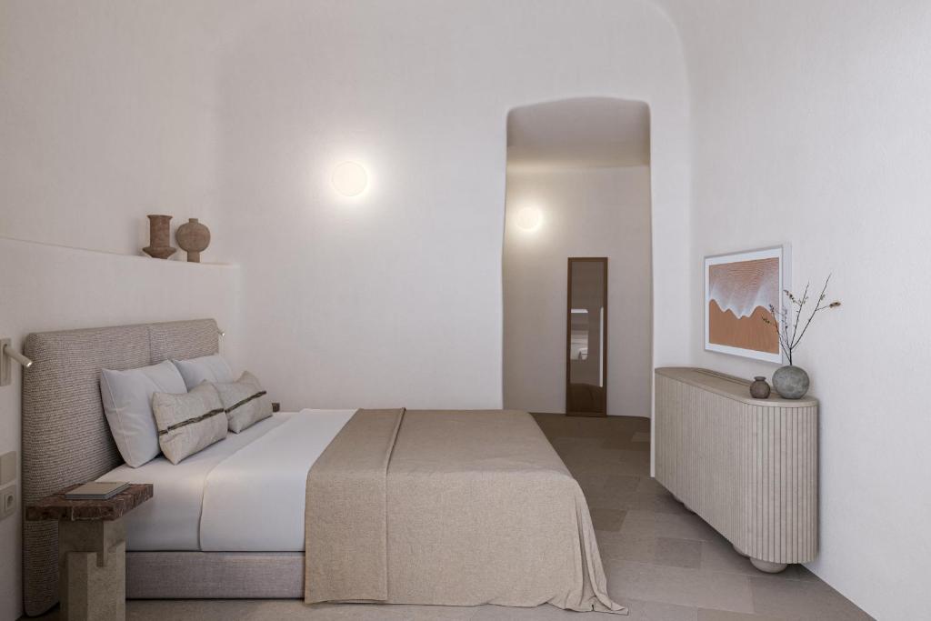 Postel nebo postele na pokoji v ubytování Canaves Ena - Small Luxury Hotels of the World