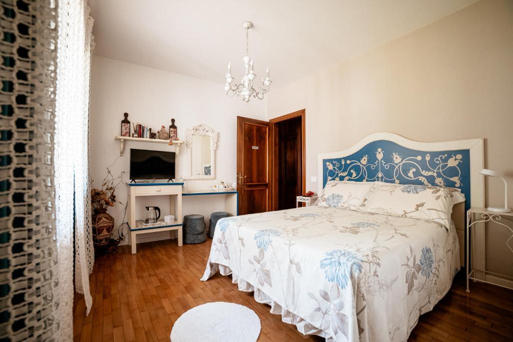 Postel nebo postele na pokoji v ubytování B&B Sweet Dreams