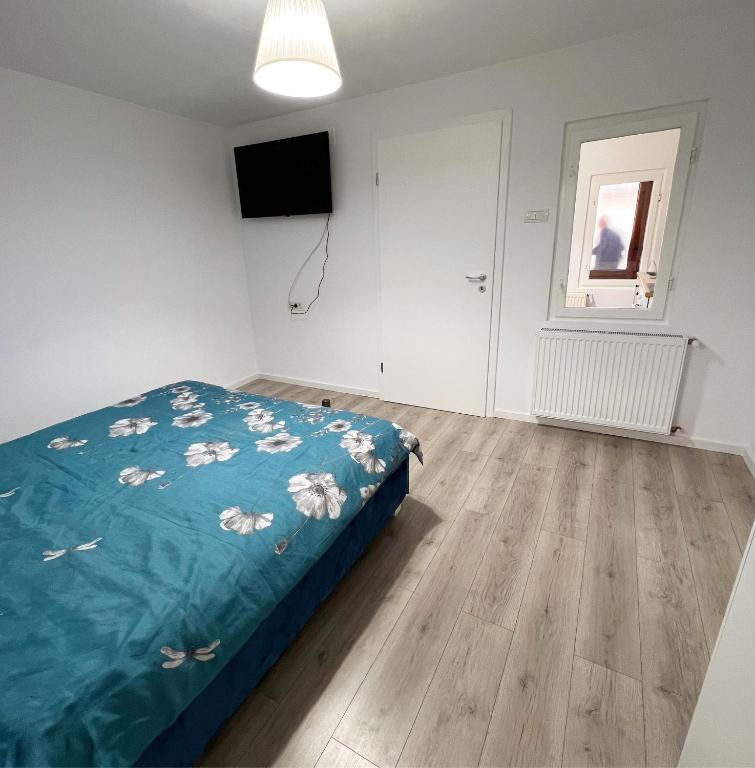 Postel nebo postele na pokoji v ubytování Damian Confort Zone