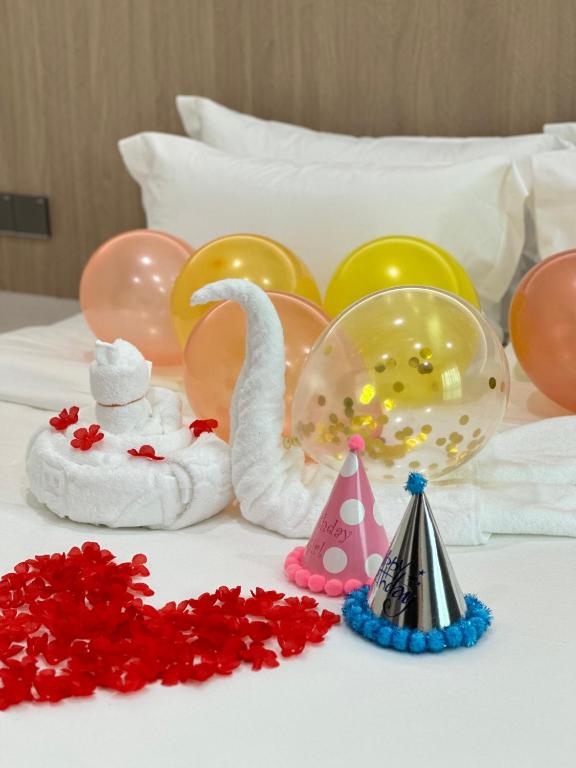 Postel nebo postele na pokoji v ubytování Wendu Inn Hotel