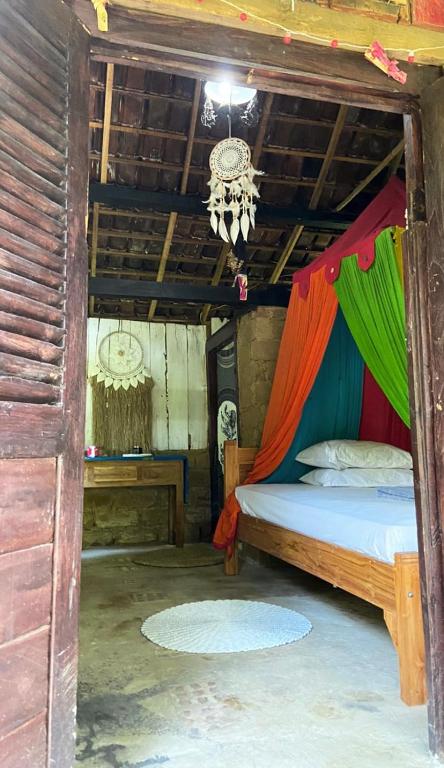 Postel nebo postele na pokoji v ubytování Alas bangkuwang Dream