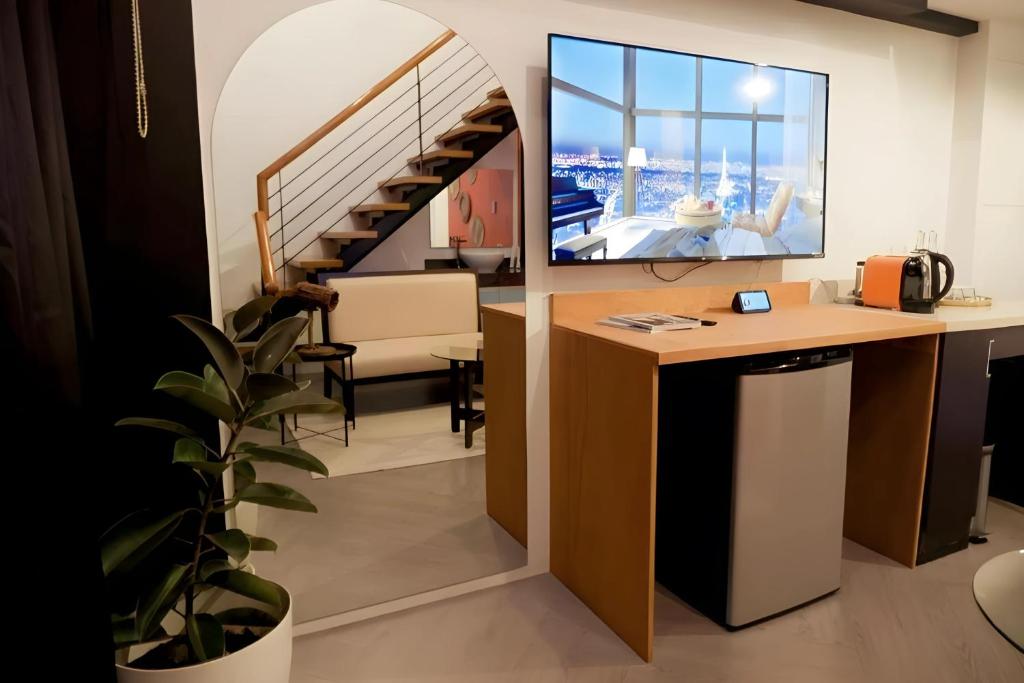 Příslušenství pro přípravu čaje a kávy v ubytování Havitat Boutique Hotel